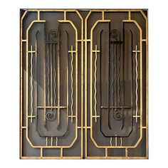 an art deco style door with metal handles