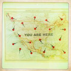 an old map with pin holes in it that says you are here and there is no where to go