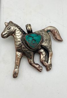 Large horse pendant set with turquoise was handcrafted in Nepal with Tibetan silver. The measurement of pendant is approximately  60mmX75mm and it weighs about 32 gm Large Horse, Horse Pendant, Horses Pendant, Pendant Set, Himalayan, Tibet, Nepal, Pendant Necklaces, Favorite Jewelry