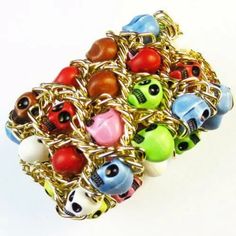 A Fun And Vibrant Rainbow Colored Carved Skull Pendant Beaded Stretch Bracelet. Goth Hot Topic Blackstar Killstar Punk Sourpuss Halloween Multicolor Novelty Bracelets For Party, Novelty Multicolor Bracelets For Party, Multicolor Bohemian Skull Jewelry, Gold Knot Bracelet, Large Cuff Bracelet, Charm Bracelet Watch, Rose Gold Cuff Bracelet, 18k Gold Bangle, Carved Skull