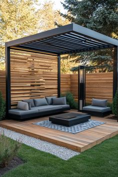 an outdoor living area with couches, tables and a pergolated patio cover