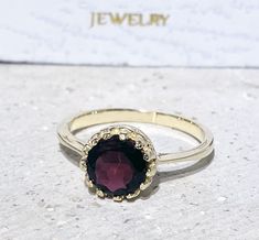 Don't miss this opportunity to own this beautiful gemstone ring crafted in 14k gold filled => Gemstone Type - Garnet => Gemstone Size - 7 mm => Gemstone Cut - Faceted => Metal Type - 14k Gold Filled (Tarnish Resistant And Nickel Free) - also available in 925 sterling silver * Please contact me for pricing on a sizes larger than 11 * ~ Feel free to ask me about custom made designs. ❏ Replacements and custom orders : ✪ 925 sterling silver - no additional cost ✪ 14k rose gold filled - n Garnet Rings Gift Round Band, Garnet Ring With Round Band For Gift, Garnet Ring With Round Band As Gift, Garnet Ring As Gift With Round Band, Garnet Crystal Ring For Anniversary, Anniversary Garnet Crystal Ring, Garnet Bezel Set Ring Jewelry, Garnet Crystal Gemstone Ring, Ruby Crystal Birthstone Ring