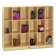 a wooden cubby with many compartments for children's toys