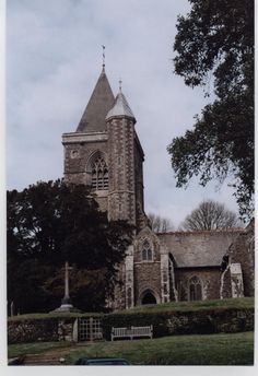 an old stone church with a steeple on top