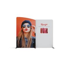 a book with an image of a woman wearing sunglasses and lipstick in front of it