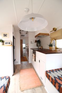 the kitchen is clean and ready to be used as a living room or dining area