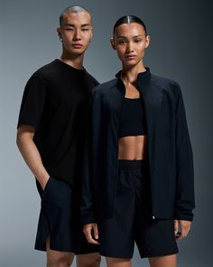 Bring your A-game with BEAMS. Japanese streetwear remixed with top level tech for unmatched comfort every day. Inspired by Tokyo streetwear, comfort is the name of the game. Featuring an exposed elastic waist with an adjustable drawstring. Cinch or loosen it for the perfect fit between games or on the go. Made with recycled polyester, the lightweight fabric means you can fly across court or town with ease. Functional side pockets mean you can go hands-free with ease. Pop two tennis balls in each Casual Stretch Track Jacket For Streetwear, Urban Activewear For Gym With Go-dry Technology, Athleisure Activewear With Relaxed Fit And Functional Drawstring, Functional Go-dry Tops For Streetwear, Functional Relaxed Fit Tops For Streetwear, Sporty Activewear With Functional Drawstring For Streetwear, Urban Black Activewear In Relaxed Fit, Athleisure Sports Track Jacket With Relaxed Fit, Athleisure Track Jacket With Functional Drawstring