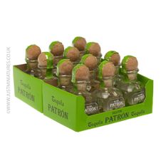 a green box filled with lots of small bottles