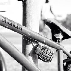 a close up of a bike's handlebars and seatposts in black and white