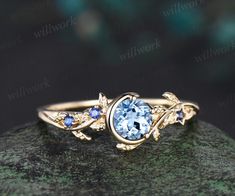 - Metal: Solid gold(10K/14K/18K white/yellow/rose gold),925 sterling silver,platinum available- Main Stone: 5mm round cut natural Tanzanite.- Accent Stone: round cut natural sapphires (Silver ring with lab sapphires).- Can be personalized: Yes Star Sapphire Ring Vintage, Sapphire Ring Vintage, Gemstone Jewelry Earrings, Sapphire Silver Ring, Wedding Ring Women, Unique Wedding Ring, Star Sapphire Ring, Aquamarine Engagement Ring, Star Sapphire