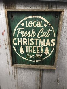 a sign that says local fresh cut christmas trees