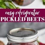 a jar filled with pickled beets sitting on top of a table next to other vegetables