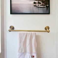 a towel rack is hanging on the wall