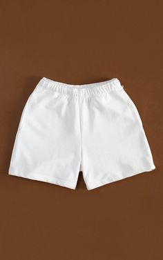 Cozy and consciously made, our 100% Organic Traceable Cotton Sweatshorts are the perfect intersection of sustainability and street style. LEARN MORE → certified organic fibre→ free from toxic substances like bleach & formaldehyde→ colored with nontoxic dyes→ water and energy are monitored→ manufactured in safe working conditions MeasurementsSizes: XS, S, M, L, XL, XXLColor: Off-white SIZE CHART Everyday Pajama Shorts, Cotton High-waisted Biker Shorts, Solid Color Athletic Shorts With Relaxed Fit, Relaxed Fit Solid Color Athletic Shorts, Summer Athletic Shorts With Elastic Waistband For Everyday, Basic Cotton Athletic Shorts For Summer, Summer Cotton Athletic Shorts For Everyday Wear, White Cotton Pajama Shorts, Solid Cotton Biker Shorts With Elastic Waistband