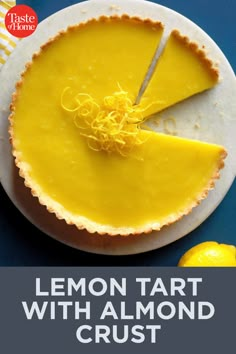 a lemon tart with almond crust on a plate