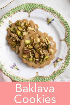 two cookies on a plate with the words bakalava cookies in front of them