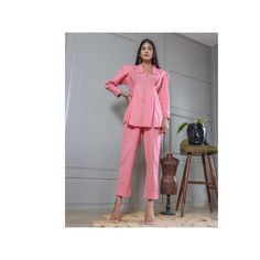 PRODUCT DESCRIPTION Pink Co Ord Set with Collar Women Straight Long Sleeves Matching Top & Pant Set Office Wear Handmade Cotton Pant Suit Dress Women Co-Ord-Set from Anuthhi's ROZANA collection. **PRODUCT DETAILS** Item Contain - Co-ord Set Material : 100% Cotton Sleeves : Long Sleeve Color : Pink ( Show In Image ) Work : Printed Work ( As Shown In Image ) Model Height : 5.8'' Approx. Fit Type : Regular Fit Color Declaration:- Pink  Customization- Yes **ABOUT PRODUCT** Co-ord sets are a must-have for any woman. The most versatile pieces for every day wear, these coordinating tops, bottoms and dresses all look great on their own or as a set. Our product are excellent and easy to wear clothing. This Two piece set are comfortable to wear official and party. There Might Be Slight Variation In Workwear Pant Set With Long Set-in Sleeves, Pink Cotton Sets Suitable For Work, Pink Long Sleeve Pant Set For Work, Pink Co Ord Set, Women Two Piece Outfit, Pant Suit Women, Suit Dress Women, Image Model, Suit Women