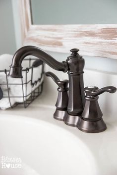 the faucet in this bathroom sink is made from an old - fashioned faucet