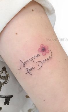 a woman with a tattoo on her arm that says, someone you dews written in cursive writing