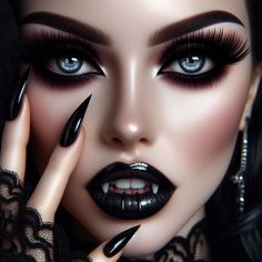 a woman with long black nails and dark makeup