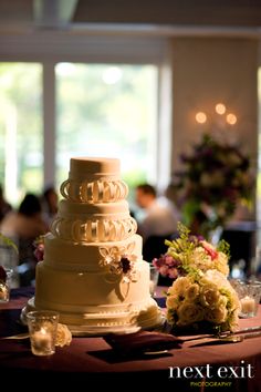 a wedding cake sitting on top of a table