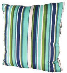 a blue and green striped pillow on a white background