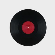 a black and red record on a white background