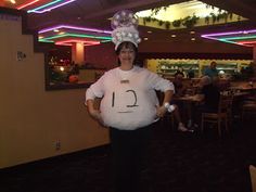 a woman in a costume that has the number twenty on it