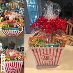 a basket filled with lots of different types of food and candy in front of a window