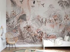 the wallpaper in this room is painted with birds and plants, while the floor has a rug on it