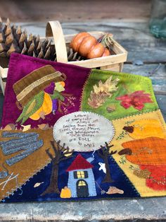 a basket filled with lots of different types of fall decorations