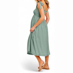 Just add slides or mules and you are good to go.This stretch maternity dress features tie straps and a smocked bodice, designed in a comfortable midi length. Made from 100% rayon with a lining of 100% rayon, it offers a relaxed yet flattering fit. It should be hand washed or dry cleaned only. The length measures 48 inches from the high point of the shoulder to the hem in size Small. Made in the USA.