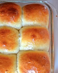 a pan filled with bread sitting on top of a table