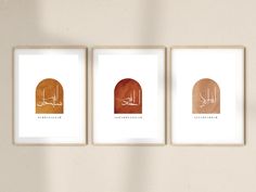 three framed art prints with arabic writing on them