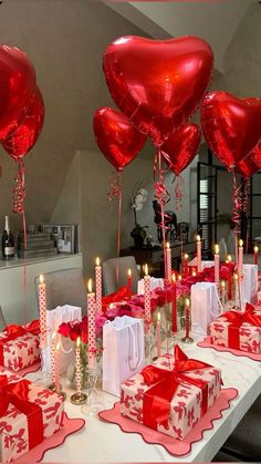 valentine's day table setting with red heart balloons