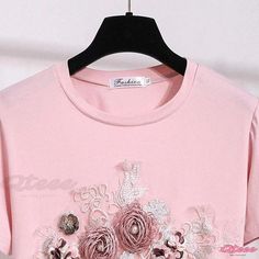 Qteee - Stylish Round Collar T-Shirt with Exquisite 3D Blossom Embroidery Pink Summer Tops With Embroidered Graphics, Pink Embroidered Tops For Summer, Pink Embroidered Summer Top, Pink Embroidered T-shirt, Pink Cotton Tops With Floral Applique, Pink T-shirt With Floral Embroidery And Short Sleeves, Summer Crew Neck T-shirt With Floral Applique, Summer Floral Applique T-shirt With Crew Neck, Floral Applique Crew Neck T-shirt For Summer