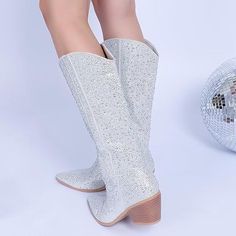 Step out in style with these must-have Sequin Glitter Silver Cowboy Boots. Crafted from premium materials, these boots feature a sequined glitter upper and a stylish asymmetrical toe for a look that is both timeless and modern. Durable and comfortable, you'll love wearing these anywhere. Rubber sole Brand Size UK Europe Canada Heel to toe 6 4 36 -37 23 8.9 6.5 4.5 37 23.5 9.1 7 5 37 - 38 24 9.2 7.5 5.5 38 24.5 9.4 8 6 38 - 39 25 9.5 8.5 6.5 39 25.5 9.7 9 7 39 - 40 26 9.9 9.5 7.5 40 26.5 10 10 8 Silver Cowboy Boots, Eras Outfits, Winter Knit Hats, Boot Accessories, Winter Knits, Tank Top Cami, Mens Sandals, Sunglass Frames, Boots Men