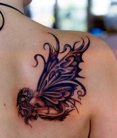 a woman with a butterfly tattoo on her back