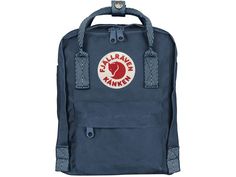 Fjallraven Kanken Mini Backpack Royal Blue/Goose Eye One Size F23561-540-908. The Mini-version is suitable for small children as well as for full grown adults who are looking for a small backpack. It is perfect for carrying a change of clothes for preschool or food on an outing and as a smart everyday bag for books water bottles fruit and more. The shoulder straps are long and adjustable and fit both small and big backs. They can be fastened with a clasp so that they are not in the way when at t Kanken Colors, Kanken Navy, Bag For Books, Fjallraven Kanken Mini, Kanken Mini, Water Resistant Backpack, Convertible Backpack, Cap Men, Address Label