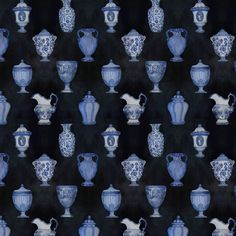 blue and white vases are on a black background in this pattern, which is very similar to the same type of urns