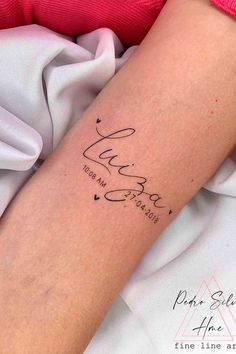 a woman's arm with a tattoo that reads, love is in the air