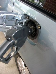 an electric car being charged at a charging station