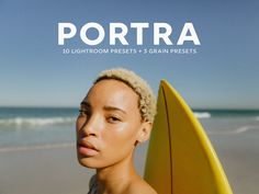 a woman holding a yellow surfboard on top of a beach