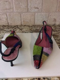 100% AUTHENTIC GIUSEPPE ZANOTTI DESIGN  MULTI COLOR SEQUINS / BEADS + UNIQUE  CRYSTAL STONE  SLINGBACKS on a 2.35" HEEL .  SIZE 7B US  MADE IN ITALY!  THEY ARE ABSOLUTELY GORGEOUS! GENTLY PREOWNED BUT IN PRISTINE CONDITION. BRAND - GIUSEPPE ZANOTTI DESIGN ITEM - MULTI COLOR UNIQUELY DESIGNED BEADED SLINGBACKS  MADE IN - ITALY CONDITION - GENTLY PREOWNED BUT IN PRISTINE CONDITION RETAIL PRICE - $895 GENDER - WOMENS HEEL HEIGHT - 2.35" INCH SIZE - 7B US COLOR - LIME / PINK / BLACK / RED / ORANGE / Multicolor Slingback Heels For Party, Multicolor Slingback Heels For Evening, Multicolor Slingback Heels For Formal Occasions, Multicolor Low Heel Heels For Formal Occasions, Multicolor Low Heel Heels For Formal Events, Multicolor Embellished Heels For Formal Occasions, Formal Multicolor Low Heel Shoes, Multicolor Embellished Evening Heels, Sequin Beading