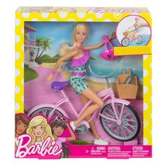 the barbie doll is riding a pink bike