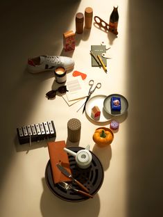 an assortment of objects are arranged on a table