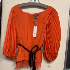 Beautiful Orange Color Top Elegant Orange Blouse For Fall, Elegant Orange Top For Fall, Elegant Orange Tops For Fall, Spring Orange Office Tops, Orange Tops For Office In Spring, Orange Office Top For Spring, Orange Tops For Office Spring Season, Elegant Orange Blouse For Work, Chic Orange Tops For Work