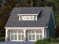 this is an artist's rendering of a garage with two dormers on each side