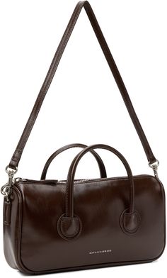 Crinkled leather shoulder bag in brown. · Rolled carry handles · Detachable shoulder strap · Logo stamp at face · Zip closure · Full logo-woven twill lining · H5.5 x W9.5 x D2.5 Supplier color: Dark brown glossy Brown Modern Satchel With Adjustable Handle, Modern Brown Satchel With Adjustable Handle, Formal Brown Bag With Adjustable Handle, Brown Leather Shoulder Bag With Adjustable Handle, Brown Formal Satchel With Adjustable Handle, Formal Brown Satchel With Adjustable Handle, Formal Brown Shoulder Bag With Adjustable Handle, Brown Briefcase With Double Handle, Business Brown Shoulder Bag With Handle Drop