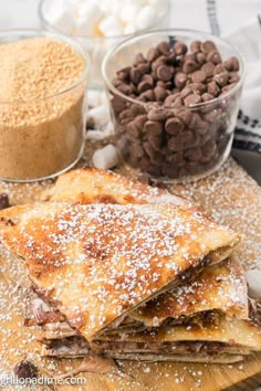 chocolate and marshmallow crepes on a cutting board